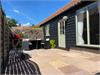 Private south facing courtyard/garden with table, chairs and a bbq for those relaxing days and alfresco dining.